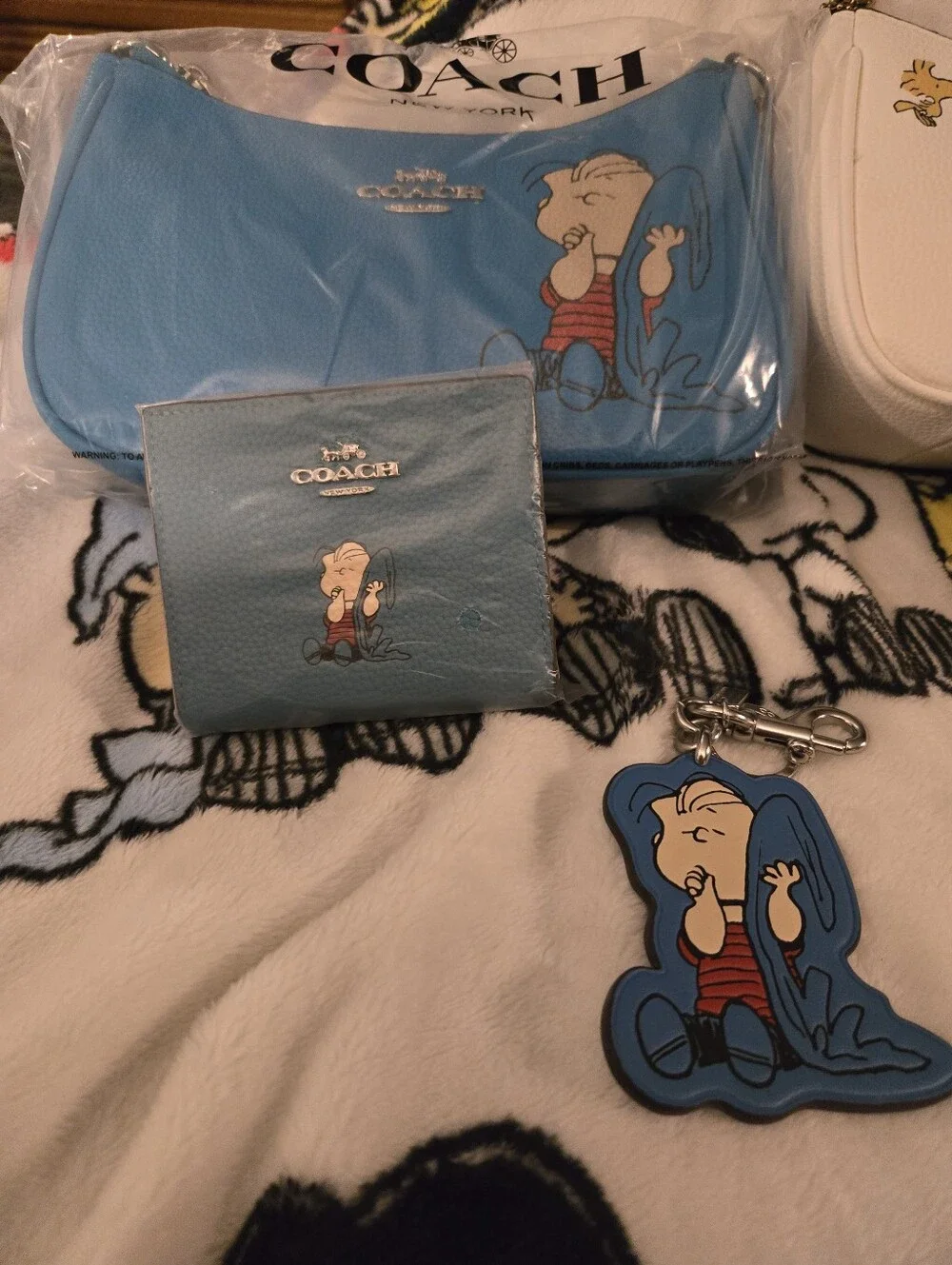 Coach Snoopy Collection Mini Bags & Wallets in White, Yellow, Blue, Cream